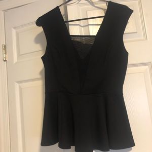 Peplum top with sheer mesh